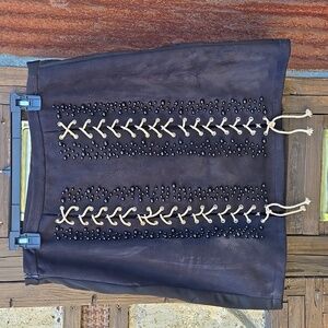 Beulah beaded and tie front black skirt in size Large
